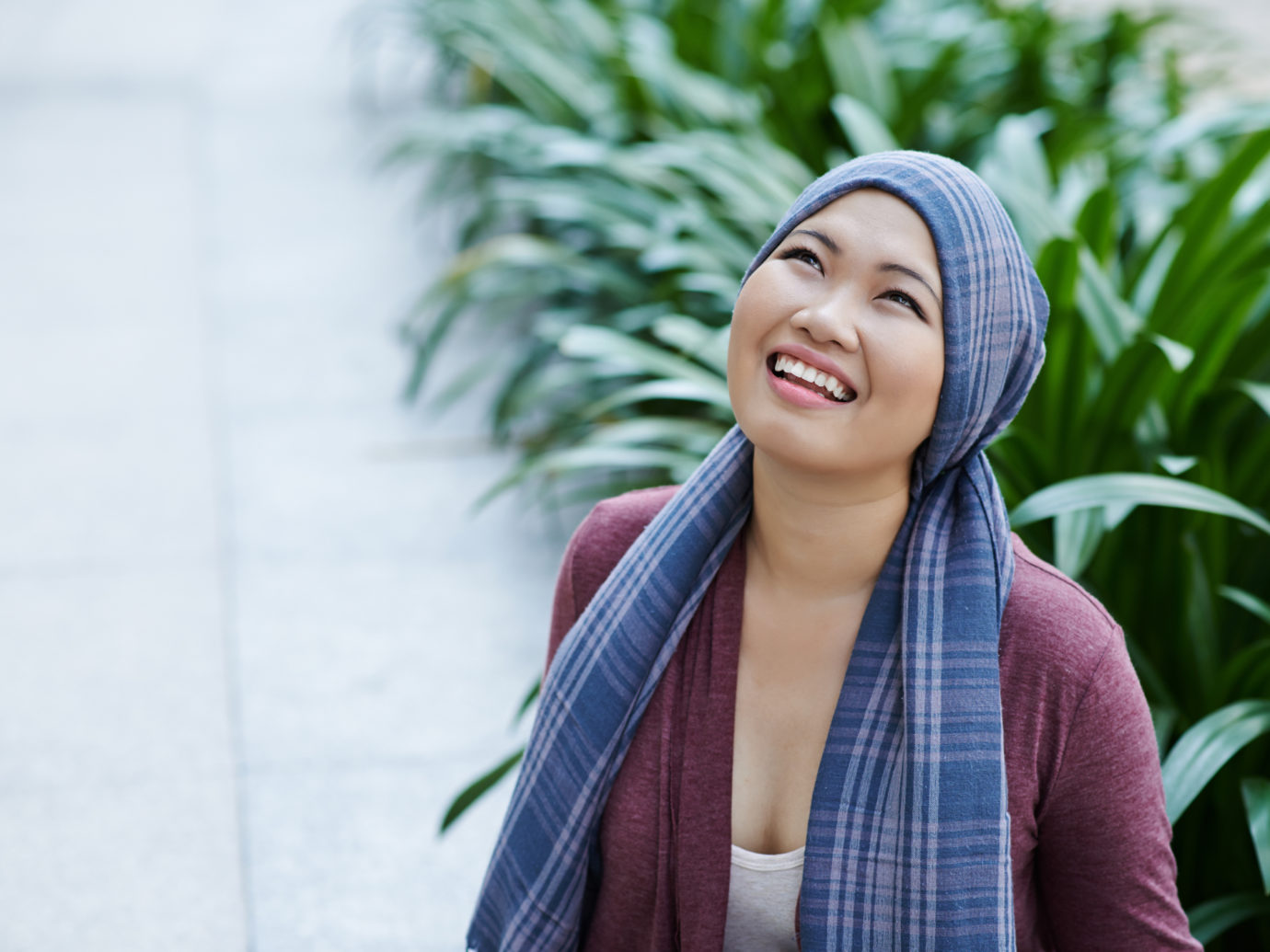 Portrait of female cancer survivor in headscarf